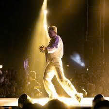 step onto the stage