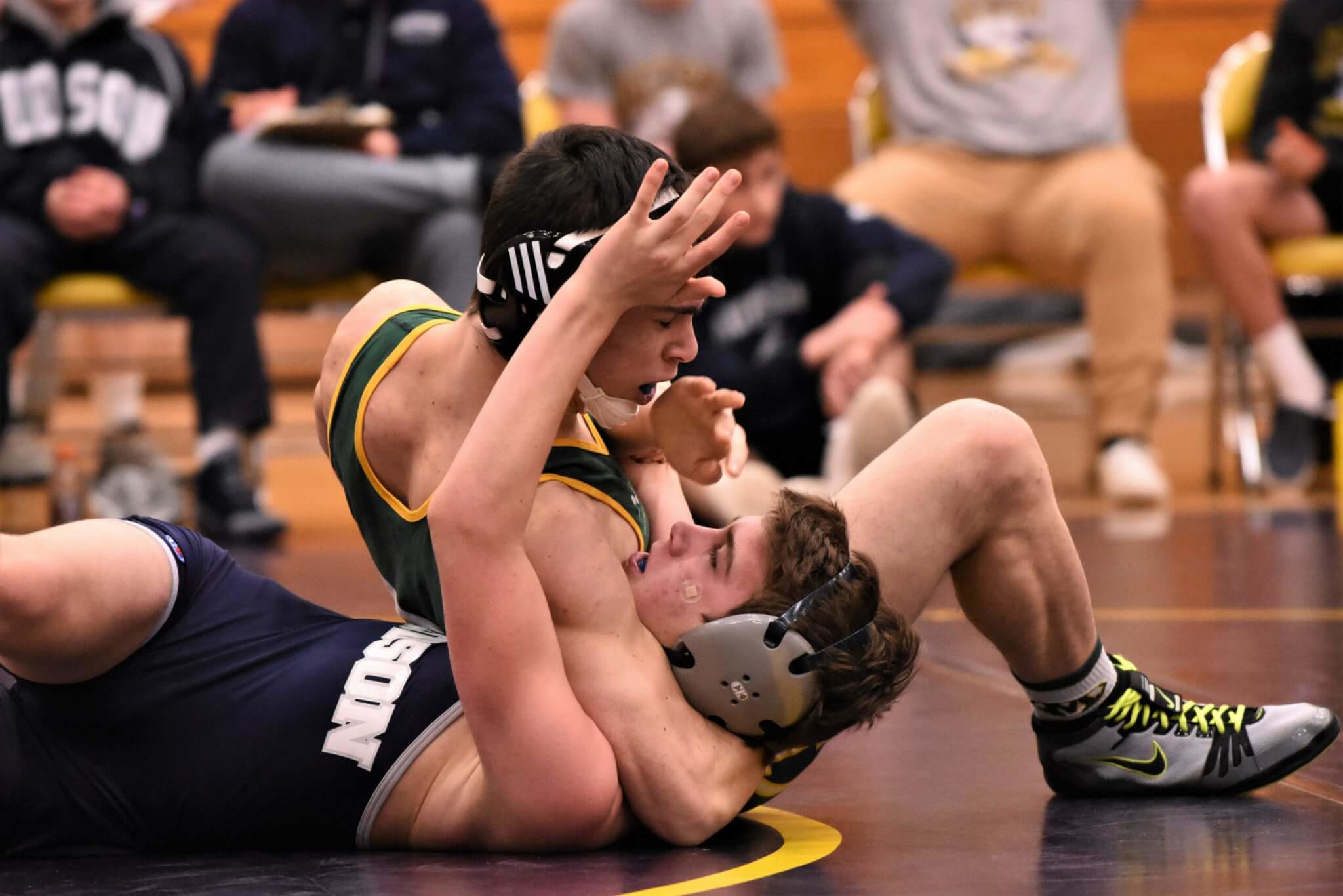 wrestle with